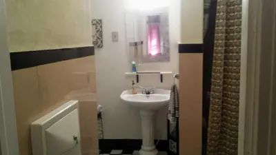 a bathroom with a sink and a bath tub at Maurrocks - A Pocono Mountains B&B in Mount Pocono