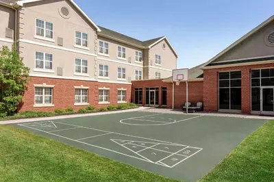 a basketball court in front of a building at Homewood Suites by Hilton Harrisburg East-Hershey Area in Harrisburg