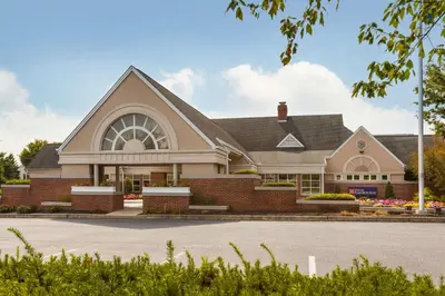a large church with a brick building at Hilton Garden Inn Lancaster in Lancaster