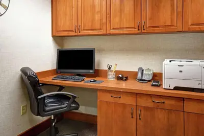 an office with a desk with a computer and a phone at Homewood Suites by Hilton Lancaster in Lancaster