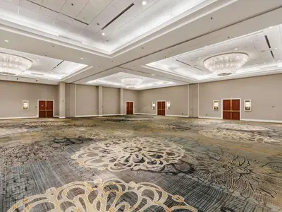 an empty ballroom with a large room with a large floor at Hilton Harrisburg near Hershey Park in Harrisburg