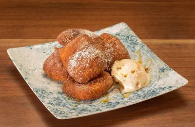 a plate of donuts and ice cream on a table at Hilton Wilmington/Christiana in Newark