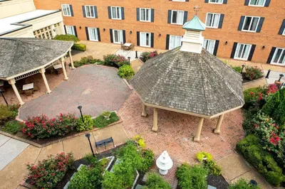 an overhead view of a courtyard with a pavilion and a building at Hilton Wilmington/Christiana in Newark