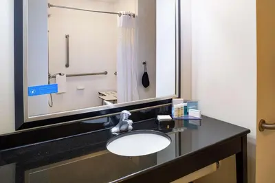 a bathroom with a sink and a shower at Hampton Inn Limerick in Limerick