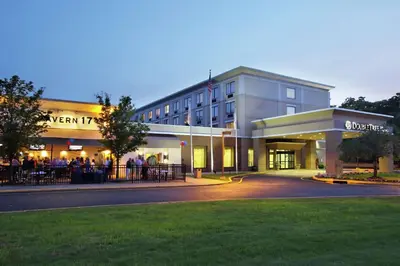 a building with people standing outside of it at DoubleTree by Hilton Mahwah in Mahwah