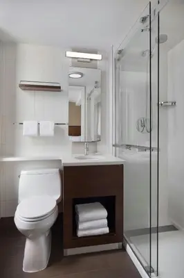 a bathroom with a toilet and a sink and a shower at Residence Inn by Marriott New York Manhattan/ Midtown Eastside in New York
