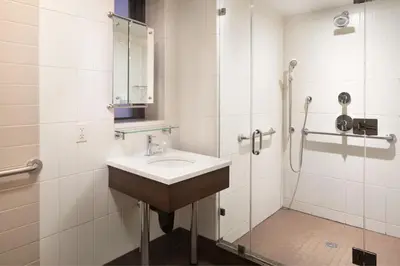 a bathroom with a sink and a shower at Residence Inn by Marriott New York Manhattan/ Midtown Eastside in New York