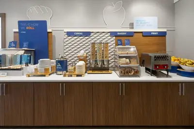 an apple store with a counter with food on it at Holiday Inn Express Philadelphia Penn's Landing by IHG in Philadelphia