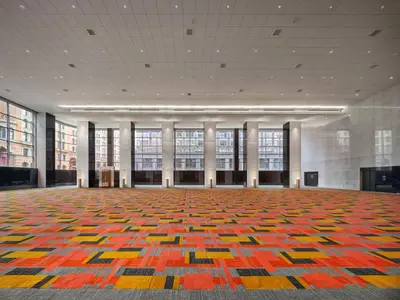 a large room with a large rug on the floor at Loews Philadelphia Hotel in Philadelphia