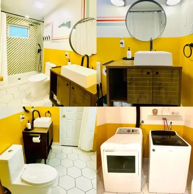 a bathroom with a sink toilet and a mirror at ⛰⛵️⛱Mt. Maplewood Lodge❤️Seasonal Specials ☆Poconos☆Cabin☆Hot⛷Tub☆Game Room☆ in Pocono Pines