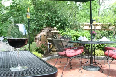 a glass of wine sitting on a table at General Warren in Malvern