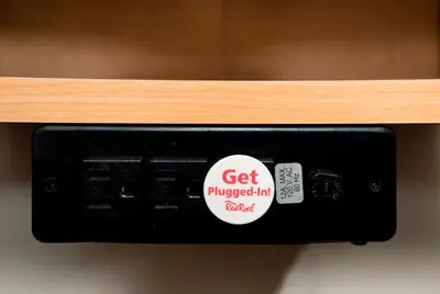 a black object with a sticker on it at Red Roof Inn Harrisburg North in Harrisburg