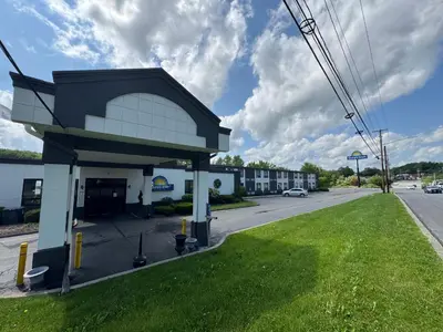 a gas station on the corner of a street at Days Inn by Wyndham Liberty in Ferndale