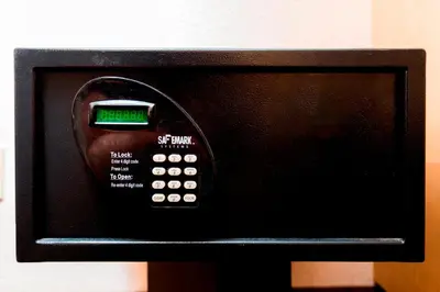 a microwave oven with a clock on top of it at Red Roof Inn Edison in Edison