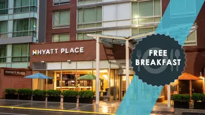 a building with a free breakfast sign in front of it at Hyatt Place New York/Midtown-South in New York