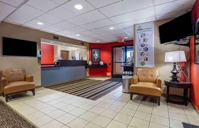 a lobby with two chairs and a waiting room at Extended Stay America Suites - Edison - Raritan Center in Edison