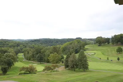 an aerial view of a golf course at The Lodge at Woodstone Country Club in Danielsville