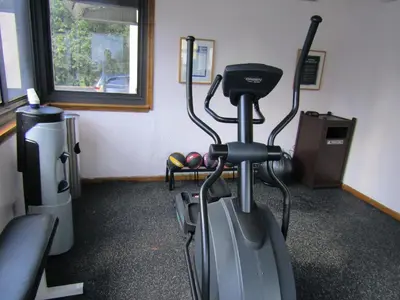 a room with a gym with a exercise bike at Days Inn by Wyndham Runnemede Philadelphia Area in Runnemede