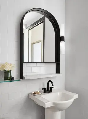 a bathroom with a sink and a mirror at Gansevoort Meatpacking in New York