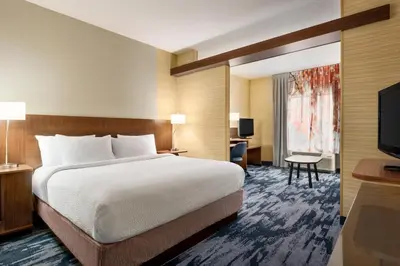 a hotel room with a bed and a television at Fairfield Inn & Suites by Marriott Hershey Chocolate Avenue in Hershey