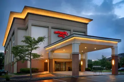 a mobil oil gas station with a sign on it at Hampton Inn Philadelphia/Mt. Laurel in Mount Laurel