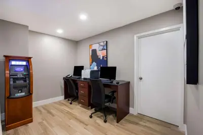 an office with a desk with a computer and a video game at Hampton Inn Philadelphia/Willow Grove in Willow Grove