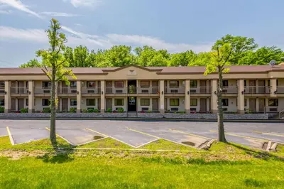 an empty parking lot in front of a building at Econo Lodge Mount Laurel - Philadelphia East in Mount Laurel