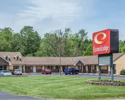 a sign in front of a hotel with a food truck at Econo Lodge Newton in Newton