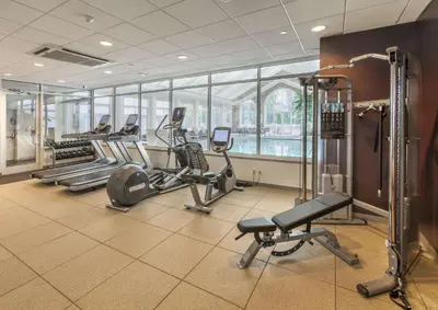 a gym with treadmills and cardio equipment in a building at DoubleTree by Hilton Nanuet in Nanuet
