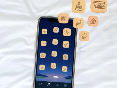 an iphone laying on a bed with icons on it at Sleep Inn & Suites of Lancaster County in Mountville