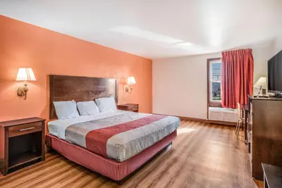a hotel room with a bed and a window at Motel 6-Levittown, PA - Bensalem in Levittown