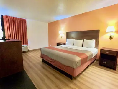 a hotel room with a large bed in a room at Motel 6-Levittown, PA - Bensalem in Levittown