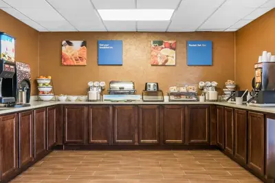 a kitchen with a counter with food items at Comfort Inn Pine Grove I-81 Hershey Area in Pine Grove