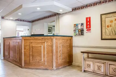 a barber shop with a wooden counter in a room at Econo Lodge Williamsport in Williamsport