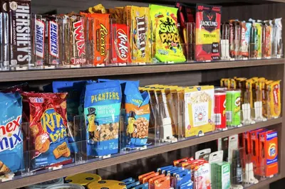 a store shelf filled with lots of different types of snacks at Home2 Suites By Hilton King Of Prussia Valley Forge in King of Prussia