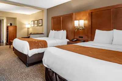 two beds in a hotel room with two at Comfort Suites Bethlehem Near Lehigh University and LVI Airport in Bethlehem