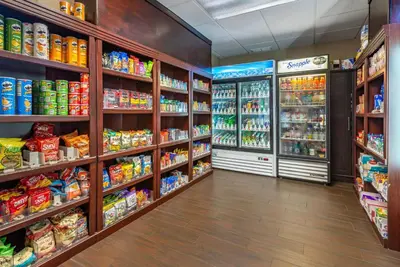 a grocery store aisle with food and drinks at Comfort Suites Bethlehem Near Lehigh University and LVI Airport in Bethlehem