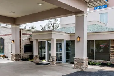 a front view of a hotel with a building at Comfort Inn - Pocono Mountains in White Haven