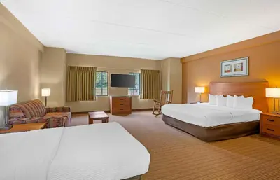a hotel room with a bed and a television at Extended Stay America Suites - Lancaster County in Mountville