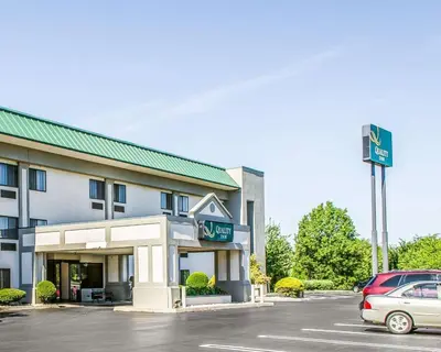 a hotel with a car parked in front of it at Quality Inn Harrisburg - Hershey Area in Harrisburg