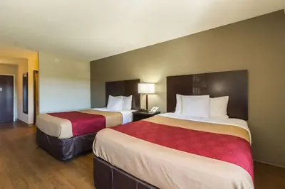 a hotel room with two beds in a room at Econo Lodge Harrisburg - Southwest of Hershey Area in Harrisburg