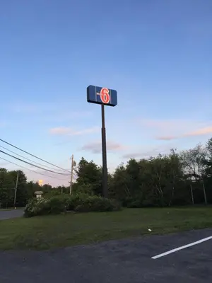 a sign on the side of a road at Motel 6-Frackville, PA in Frackville