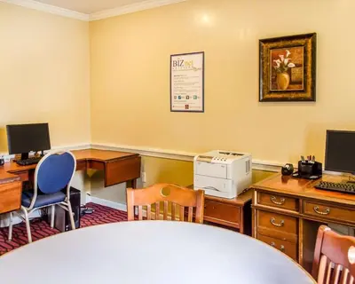 an office with a desk and chairs and a computer at Clarion Inn Strasburg - Lancaster in Strasburg
