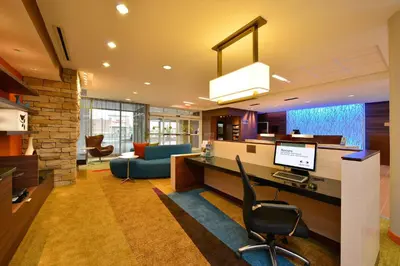 an office with a desk with a computer on it at Fairfield Inn & Suites by Marriott Elmira Corning in Horseheads