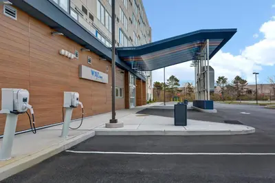 a building with a pay phones next to a street at Aloft Secaucus Meadowlands in Secaucus