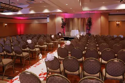 a conference room with rows of chairs and a stage at Radisson Hotel Philadelphia Northeast in Trevose