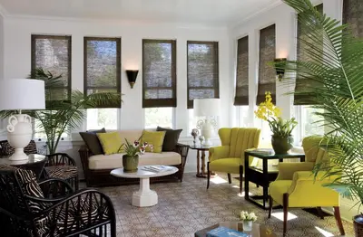 a living room with a couch and chairs and windows at Hotel Fauchere in Milford