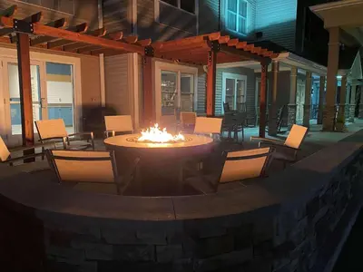 a fire pit on the patio of a house at Country Inn & Suites by Radisson, Lehighton-Jim Thorpe, PA in Lehighton
