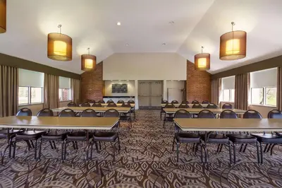 a conference room with tables and chairs in it at Best Western Lock Haven in Lock Haven