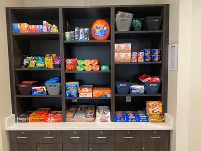 a pantry filled with lots of food and snacks at Best Western Plus Horseheads - Elmira in Horseheads